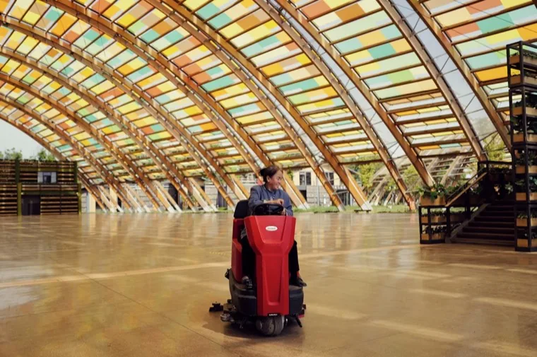 Commercial floor cleaned with a ride-on auto-scrubber
